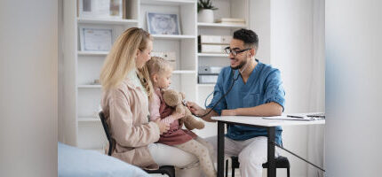 Doctor examining his patients